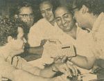 Mohd-Rafi-in-a-song-rehersal-with-Shammi-Kapoor,-Hasrat,-Jaikishan-and-others.jpg