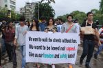 Karanveer Bohra with his wife Teejay and Kushaal Punjabi Protest against rape case .jpg