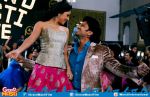 Riteish Deshmukh and Sonalee Kulkarni in still from the movie Grand Masti (2).jpg