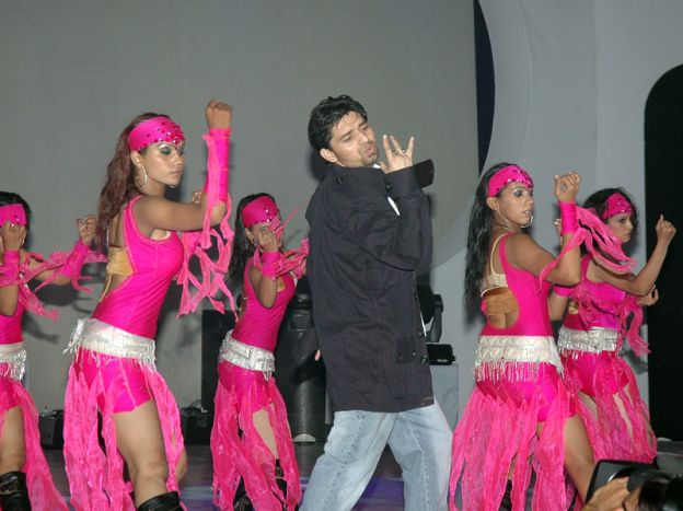 Choreographer Sooraj while performing with his team