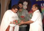 Host felicitating the Guest with flowers (Mr. Mukesh Gupta & Arti Mehra).jpg