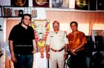 P3 - Binu Nair with Pervez jr. grandson of Mohd Rafi and ardent Rafi Lover Bhure saab at the legends music room.jpg