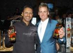 Jeev Milkha Singh and Ian Poulter at the Johnnie Walker Classic - Golfers behind the bar at the Johnnie Walker Classic - Golfers behind the bar.jpg