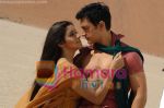 Asin Thottumkal and Aamir Khan in movie Ghajini (3).jpg