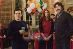 John Leguizamo, Alfred Molina, Debra Messing in still from the movie Nothing Like the Holidays.jpg