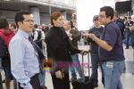 John Leguizamo, Debra Messing, Alfredo De Villa in still from the movie Nothing Like the Holidays.jpg