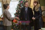 John Leguizamo, Elizabeth Pe�a, Debra Messing in still from the movie Nothing Like the Holidays.jpg