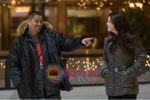 Melonie Diaz, Jay Hernandez in still from the movie Nothing Like the Holidays.jpg