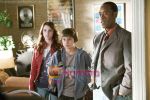 Don Cheadle, Emma Roberts, Jake T. Austin in a still from movie Hotel for Dogs.jpg