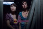 Emily Browning, Arielle Kebbel in still from the movie The Uninvited (1).jpg