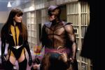 Malin Akerman, Patrick Wilson in still from the movie Watchmen.jpg