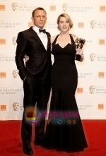 Daniel-Craig-and-Kate-Winslet-pose-at-the-winner_s-board-at-The-Orange-British-Academy-Film-Awards-held-at-the-Royal-Opera-House-on-February-8,-2009-in-London,-England.jpg