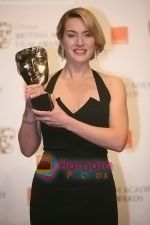 Kate-Winslet-poses-at-the-winner_s-board-at-The-Orange-British-Academy-Film-Awards-held-at-the-Royal-Opera-House-on-February-8,-2009-in-London,-England.jpg