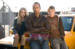 Dwayne Johnson, AnnaSophia Robb, Alexander Ludwig in still from the movie Race to Witch Mountain (1).jpg