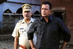 om puri and mithun chakrobarty in the still from movie Baabarr.jpg