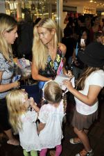 Denise Richards shops at Fred Segal with her daughters in Los Angeles, California on 22.08.09 - RK-IANS-WENN (2).jpg