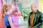 Bruce Willis, Rosamund Pike in still from the movie SURROGATES.jpg