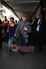 Aamir Khan and Kiran Rao arrive at Mumbai airport for father Tahir Hussain_s funeral on 3rd Feb 2010 (6).JPG