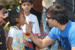 Vivek Oberoi meets Sneha Sadhan children in Andheri on 13th March 2010 (21).JPG