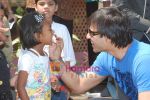 Vivek Oberoi meets Sneha Sadhan children in Andheri on 13th March 2010 (22).JPG