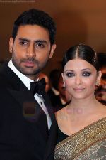 Abhishek, Aishwarya Rai Bachchan attend the premiere of OUTRAGE at the Palais des Festivals during the 63rd Annual International Cannes Film Festival on May 17, 2010 in Cannes, France (3).jpg