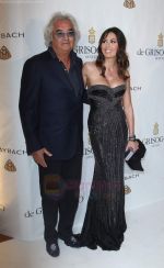 Flavio Briatore and Elisabetta Gregoraci attend the de Grisogono party at the Hotel Du Cap on May 18, 2010 in Cap D_Antibes, France (4).JPG