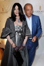 Isabelle Adjani and Fawaz Gruosi attend the de Grisogono party at the Hotel Du Cap on May 18, 2010 in Cap D_Antibes, France (1).JPG