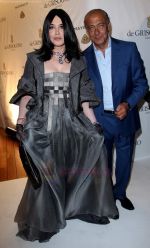 Isabelle Adjani and Fawaz Gruosi attend the de Grisogono party at the Hotel Du Cap on May 18, 2010 in Cap D_Antibes, France (4).JPG