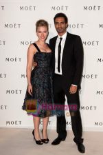 Scarlett Johansson and Bollywood star Arjun Rampal at Moet Chandon event (2).JPG