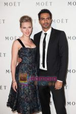 Scarlett Johansson and Bollywood star Arjun Rampal at Moet Chandon event.JPG