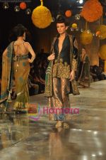 Model walks the ramp for Manish Malhotra Show on day 1 of HDIL on 6th Oct 2010 (32)~0.JPG