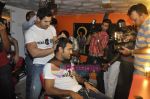 John Abraham,  Mahendra Singh Dhoni style each other at Mad-o-wat salon in Bandra, Mumbai on 4th Dec 2010 (14).JPG