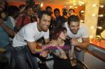 John Abraham,  Mahendra Singh Dhoni style each other at Mad-o-wat salon in Bandra, Mumbai on 4th Dec 2010 (35).JPG