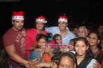 John Abraham, Akshay Kumar, Ritesh Deshmukh spend christmas with children of St Catherines in Andheri on 25th Dec 2010 (59).JPG