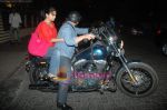 Arshad Warsi on his Harley bike with wife Maria as they went to watch The King_s Speech on 8th March 2011 (10).JPG