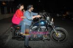 Arshad Warsi on his Harley bike with wife Maria as they went to watch The King_s Speech on 8th March 2011 (12).JPG