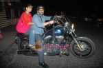 Arshad Warsi on his Harley bike with wife Maria as they went to watch The King_s Speech on 8th March 2011 (13).JPG