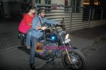 Arshad Warsi on his Harley bike with wife Maria as they went to watch The King_s Speech on 8th March 2011 (3).JPG