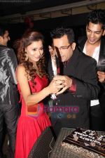 Sara Khan and Indraneel Bhattacharya In A Dangerous Pose at Ram Milaayi Jodi 100 Episodes Success Bash in Tunga Regale, Andheri East on 14th March 2011.jpg