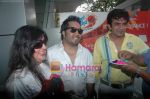 Mika Singh, Dolly Bindra, Raja Chaudhary play holi in Andheri on 15th March 2011 (24).JPG