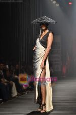 Model walks the ramp at Tarun Tahiliani_s show on Wills Lifestyle India Fashion Week 2011 - Day 1 in Delhi on 6th April 2011 (58).JPG