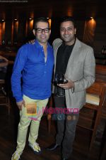 Vikram Raizada and Ash Chandler at the Launch of Reveilo wines Italian varietal Sangiovese in Escobar, Bandra, Mumbai on 29th May 2011.JPG