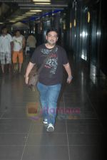 Adnan Sami snapped at International Airport after concerts in Dubai, NZ and Australia on 19th June 2011 (5).JPG