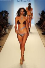 A model walks the runway at the A.Che show during Mercedes-Benz Fashion Week Swim 2012 at The Raleigh on July 16, 2011 in Miami Beach, Florida (4).JPG