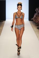 A model walks the runway at the White Sands Australia show during Merecdes-Benz Fashion Week Swim 2012 at The Raleigh on July 15, 2011 in Miami Beach, Florida. (3).JPG