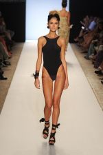 A model walks the runway at the White Sands Australia show during Merecdes-Benz Fashion Week Swim 2012 at The Raleigh on July 15, 2011 in Miami Beach, Florida..JPG