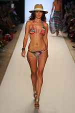 A model walks the runway during LSPACE BY MONICA WISE show at Mercedes-Benz Fashion Week Swim shows at The Raleigh on July 15, 2011 in Miami Beach, Florida (3).JPG