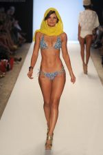 A model walks the runway during LSPACE BY MONICA WISE show at Mercedes-Benz Fashion Week Swim shows at The Raleigh on July 15, 2011 in Miami Beach, Florida (5).JPG