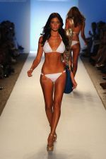 A model walks the runway for the Caffe Swimwear show during Mercedes-Benz Fashion Week Swim 2012 at The Raleigh on July 16, 2011 in Miami Beach, Florida (2).JPG