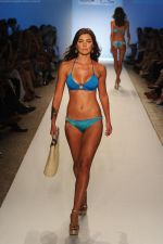 A model walks the runway for the Caffe Swimwear show during Mercedes-Benz Fashion Week Swim 2012 at The Raleigh on July 16, 2011 in Miami Beach, Florida (4).JPG